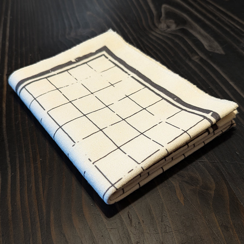 21x27 inch hex grid battle map with 1-inch grid pattern, weathered screen-printed design. Flat, foldable, and travel-friendly tabletop map for tactical RPG encounters.