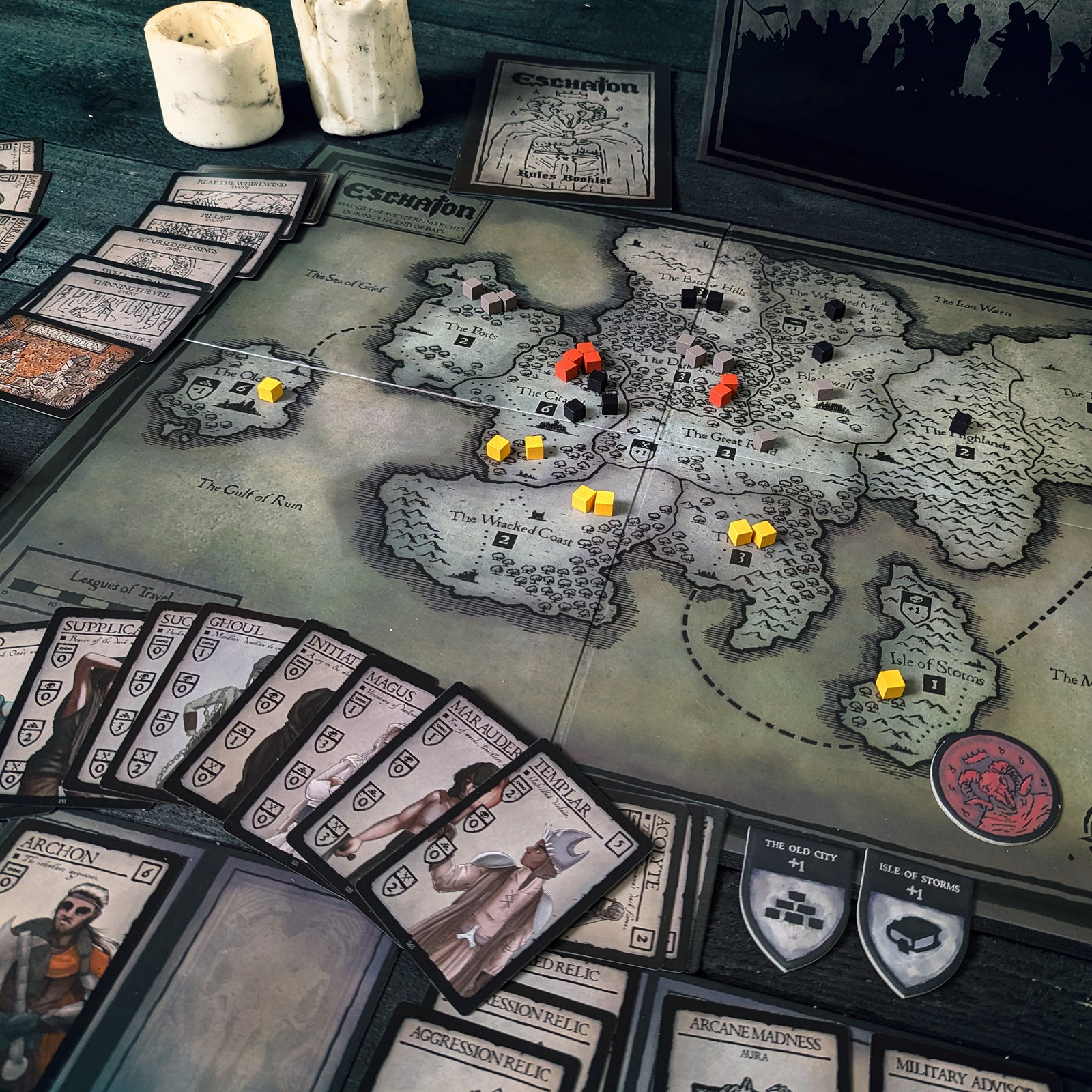 Cultist cubes mark battles across the realm map in the board game Eschaton.