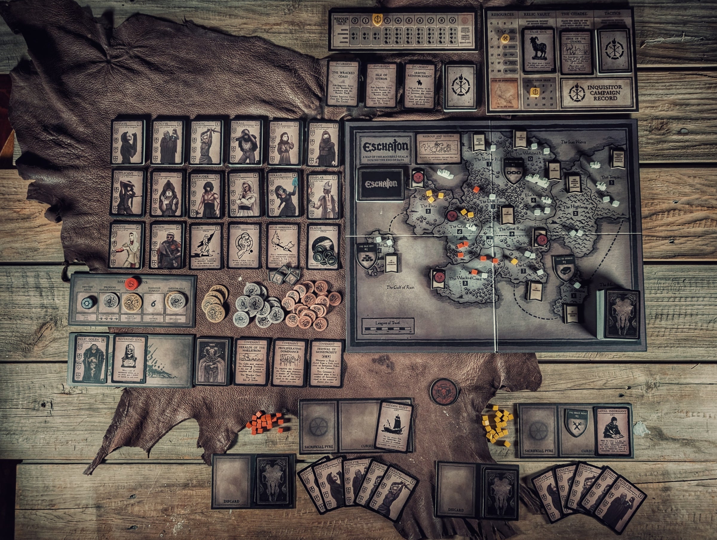 Components of Eschaton: Iconoclasm. View of all board game pieces.