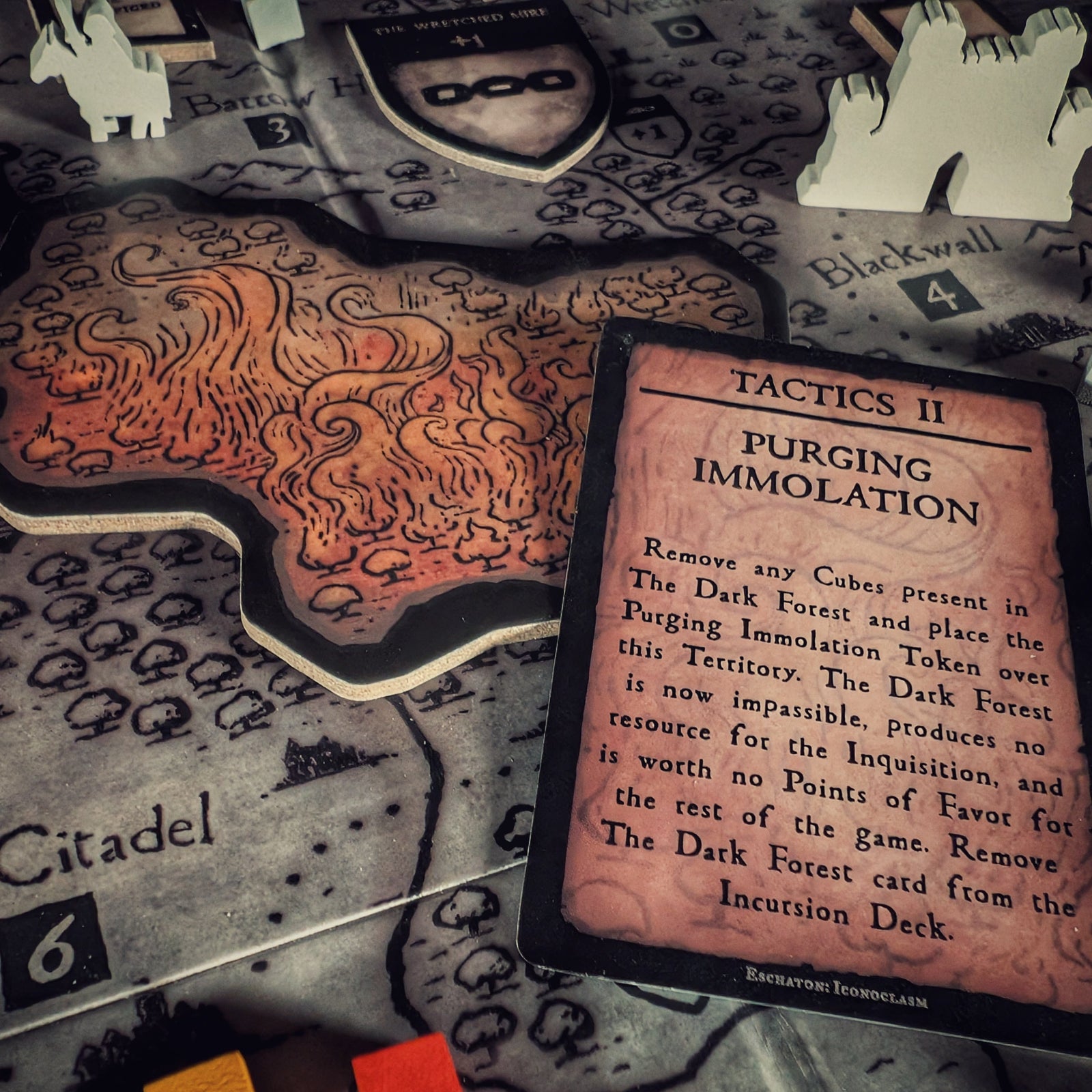 Tokens from Eschaton: Iconoclasm board game. Cooperative deck-building expansion.