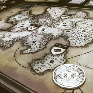 Eschaton Metal Round Marker on Realm Map by Archon Games. Artwork by Adam Watts.